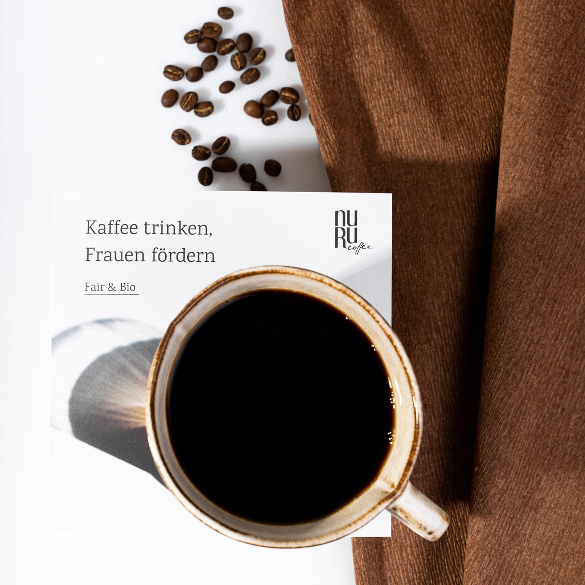 Geschenkgutschein für unsere Podukte / nuruCoffee fairer, nachhaltiger Kaffee mit social Impact