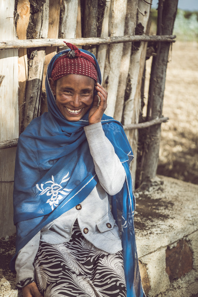 nuruwomen lächelnde Frau aus Äthiopien / nurucoffee - nachhaltiger, fairer Bio-Kaffee mit social impact